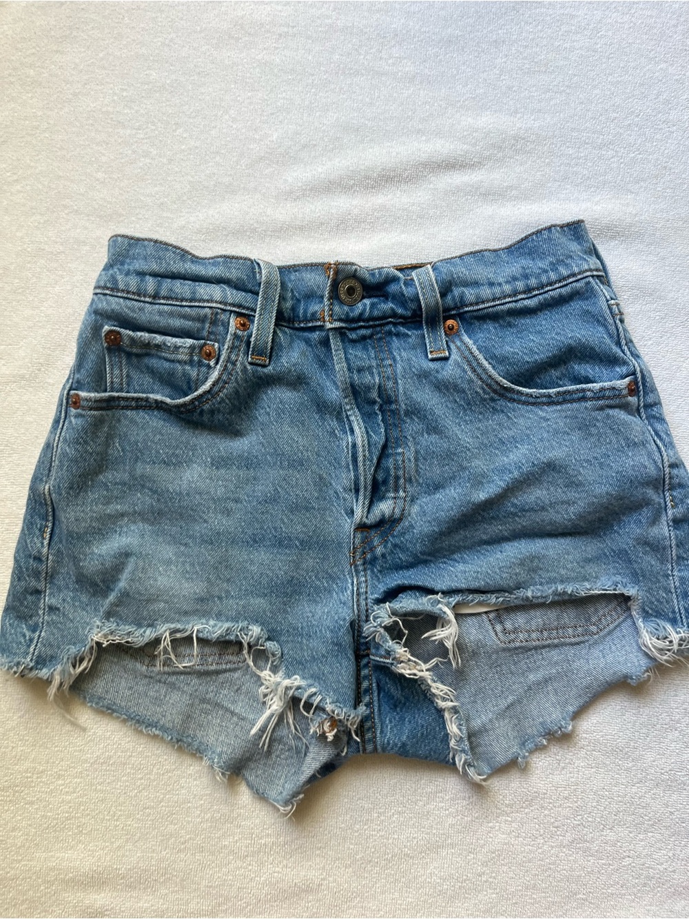Levi's blue denim jeans with tan leather patch and red tab
